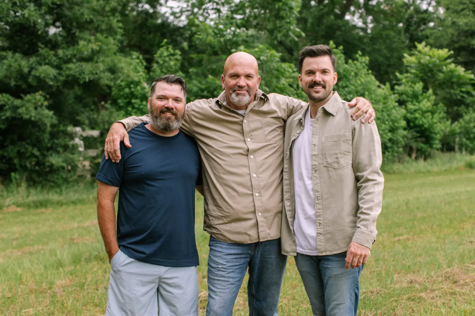 Southland Fence Co. owners and family standing together outdoors
